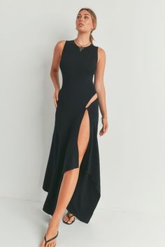 Elevate your wardrobe with our Maxi Dress With Slit, a versatile and elegant piece that seamlessly blends style and comfort. Crafted from 100% viscose, this dress offers a luxurious feel against your skin while ensuring breathability and ease of movement.  Key Features: Fabric: Made from 100% viscose for a soft and lightweight feel. Fit: Choose from sizes S, M, and L to find your perfect fit. Color Options: Available in classic black for timeless sophistication. Design: Features a flattering max Chic Natural, Bodycon Maxi Dresses, Activewear Sets, School Project, Flattering Dresses, Black Maxi, Black Maxi Dress, Plus Size Tops, Project Ideas