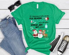 Premium quality, custom adorable Flu Season Shirt. Cute Santa, Snowman, and Reindeer shirt for any health office, medical clinic, school health staff, or other health professional. Perfect Holiday T-Shirt for all health staff! Sizing: - Runs true to retail size, but some people might prefer to size up or down - Please check the size chart added to the pictures - Unisex design is comfortable and flattering for both men and women - Fit style is retail fit* *I would describe this fit as a more tail Dr Office, Infection Control Nursing, Unisex Looks, Reindeer Shirt, School Health, Office Shirt, Health Professional, Christmas T Shirt Design, School Nurse