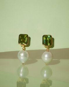 Introducing our new demi-fine jewelry Pair of drop stud earrings featuring an emerald cut Peridot stone and Freshwater Pearls Studs are 25mm tall Freshwater pearls are 11mm Peridot stones are 9mm x 7mm Each earrings weighs 2.7grams Carat weight is 22.63 Made with Gold Vermeil plated sterling silver, Freshwater Pearls + Peridot Stones Personalised Jewellery Necklaces, Instagram Gift, Peridot Stone, Solitaire Studs, Demi Fine Jewelry, Diamond Shop, Pearl Studs, Emerald Cut, Gold Vermeil