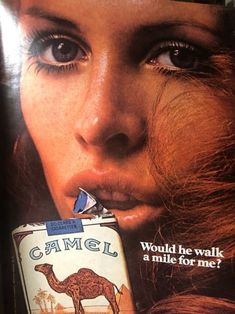 an advertisement for camel milk with a woman's face sticking out of the can