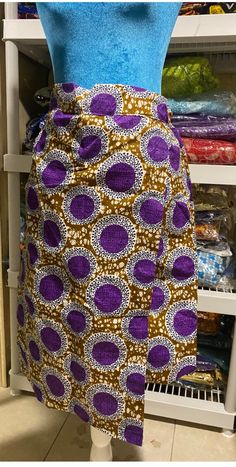 African Print Short  Wrap Skirt,  Ankara fabric, Nigeria Ankara women skirt, women skirt, Afrocentric, women clothing, women summer skirt, Ready to Wear.  100% cotton Available sizes: Medium, Large and Extra Large  * Zipper *  Women  * short skirt  * 100% Cotton  * brand new and high quality! Kindly allow a difference of the picture/pattern of your item(s) between the real-life image and the photographic image on the website. Care instructions: Hand wash in cold water- Do Not BLEACH - Dry Clean Only. Return policy  1. Item is not used 2. Item is still in its original packaging. 3. Item is odorless  4. the item is not winked up  4. 5% restocking  fees. Traditional Long Skirt Cotton Dress, Traditional Long Cotton Dress, Cotton Lined Pencil Skirt, Cotton Long Lined Skirt, Long Cotton Pleated Skirt, Bohemian Cotton Mini Skirt With Relaxed Fit, Elegant Cotton Wrap Skirt With Lining, Traditional Pleated Skirt, Cotton Flowy Wrap Skirt