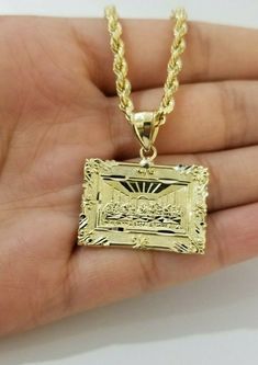 "REAL 10k Yellow Gold Rope Chain Last Supper Charm Pendant SET 3mm Necklace 18\"-28\" Genuine 10 k Yellow Gold Rope Chain 3mm With Ankh Cross diamond cuts design. The Various length of the Chain are 18\"-28\" with last supper pendant 1.3 inches. The pendants are unique in design and considered durable too. The weight of the charm is 2.8-3 grams and weight of the necklace is 4-8 grams. If you are not happy with the way it looks or feels, we do offer 15 - Days FREE Return shipping. Contact us for Custom Gold Jewelry, Ankh Cross, Gold Rope Chains, Last Supper, Rope Chain, Pendant Set, Cut Design, Cross Pendant, Charm Pendant