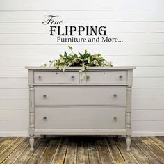 a white dresser with flowers on top and the words flipping furniture and more above it