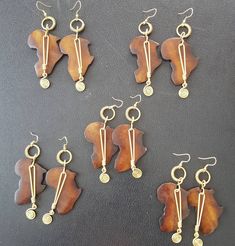 This listing is for 5 pairs of earrings. Handmade with bones and brass. Dimensions; 3.5 inches long. More earrings; https://www.etsy.com/shop/TribalTess?ref=seller-platform-mcnav&section_id=21293980 **Buy multiple items and pay shipping for ONE item ONLY. Brown Brass Drop Earrings, Brown Brass Earrings, Map Earrings, African Map, Horn Earrings, Bone Earrings, Brown Earrings, African Earrings, Bone Necklace