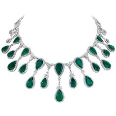 An elegant necklace, showcasing 20 perfectly matching pear shape Colombian emeralds weighing 63.40 carats total, surrounded by 758 brilliant mixed-cut diamonds weighing 32.99 carats total. Intricately made with 18K white gold. Perfect for luxurious occasions. Roman Malakov took more than a decade to source these precious stones and make them into a gorgeous necklace.  Roman Malakov is a custom house, specializing in creating anything you can imagine. If you would like to receive a special quote Heart Shaped Diamond Necklace, Emerald And Diamond Necklace, Diamond Drop Pendant, Drop Pendant Necklace, Fringe Necklace, Colombian Emeralds, Expensive Jewelry, Heart Shaped Diamond, Antique Necklace