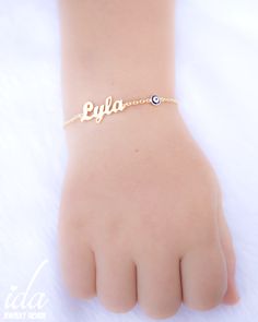 Custom name bracelet with your desired name and evil eye. A unique personalized baby shower gift, or unique gift for kids... .We handmade each piece with care and love ♡ ★ PRODUCT DETAILS; Size Options: Available in BABY SIZE, ADULT SIZE, KIDS SIZE (please select from the menu) *Material Options: 925k Sterling Silver & Rose Gold Filled Over Silver & Yellow Gold Filled Over Silver ★ HOW TO PLACE YOUR ORDER; *Please select your desired material from the menu while adding to card. *Please w Hypoallergenic Nameplate Bracelet As Gift, Cute Handmade Name Bracelet For Personalized Gift, Customizable Cute Name Bracelet For Gift, Customizable Cute Name Bracelet Gift, Cute Name Bracelet As Gift, Cute Personalized Name Bracelet As Gift, Cute Custom Name Bracelet For Personalized Gift, Cute Personalized Name Bracelet Gift, Cute Personalized Name Bracelet For Gift