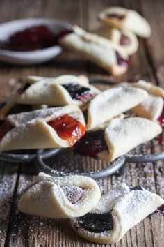 small pastries with jelly filling on wooden table