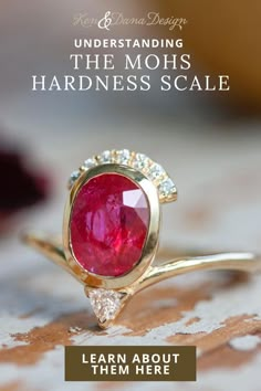 an image of a ring with a red stone on it and the words learn about them here