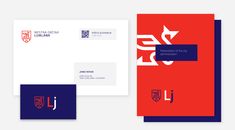 two business cards and envelopes with the letter j in red, blue and white