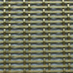 a close up view of a woven metal screen with gold colored strips on the sides