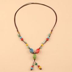 Material: Ceramic Fashion Element: Round Style: Ethnic Style Bohemian Multicolor Beaded Jewelry, Multicolor Beaded Bohemian Jewelry, Bohemian Jewelry With Colorful Beads, Bohemian Beads With 108 Beads For Festival, Multicolor Dangling Beads Jewelry For Vacation, Bohemian Jewelry With Colorful Beads For Vacation, Bohemian Multicolor Jewelry With Dangling Beads, Bohemian Necklace With Dangling Beads, Bohemian Beaded Necklaces With Dangling Beads