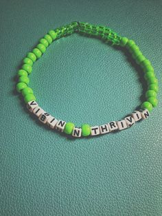 Vsco beaded neck choker “VIBIN N THRIVIN” Cute Green Bracelets With Letter Beads, Vibin N Thrivin, Rave Style Jewelry With Letter Beads As Gift, Green Name Bracelet With Letter Beads, Kandi Necklace Choker, Lgbtq Kandi Bracelets, Beaded Chocker, Festival Outfit Inspiration, Kandi Ideas