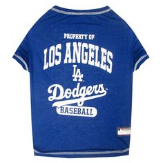 the los angeles dodgers dog t - shirt is blue and has white lettering on it