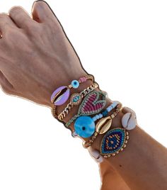 Cowrie Shell Bracelet, Summer Jewelry Trends, Puka Shell, Blue Cross, Summer Bracelets, Shell Bracelet, Cowrie Shell, Evil Eye Bracelet, Gold Glass