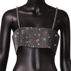 Our EUPHORIA top is a see through top made of rhinestone fishnet fabric. SIZE Bust Waist 26.77-37.40 4.72 Party Fishnet Mesh Crop Top, Party Mesh Crop Top With Fishnet Details, Party Mesh Top With Sequins, Summer Party Fishnet Crop Top, Summer Party Mesh Top With Rhinestones, Black Sequined Mesh Top For Party, Black Party Crop Top Adorned With Rhinestones, Black Party Crop Top With Rhinestones, Silver Rhinestone Crop Top For Party