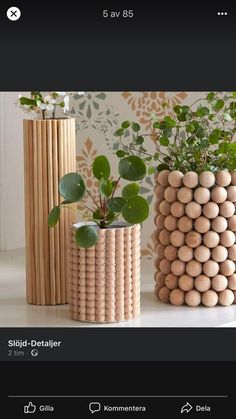 three wooden vases with plants in them