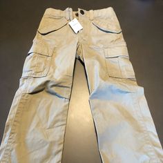 Gap Cargo Khaki Pants. Size 4. Gap Cotton Cargo Pants With Pockets, Gap Cotton Cargo Pants, Gap Cotton Cargo Style Bottoms, Gap Casual Pants With Cargo Pockets, Cotton Cargo Pants By Gap, Gap Cotton Cargo Bottoms, Gap Cotton Bottoms With Side Pockets, Gap Jeans With Pockets, Gap Cotton Pants With Side Pockets