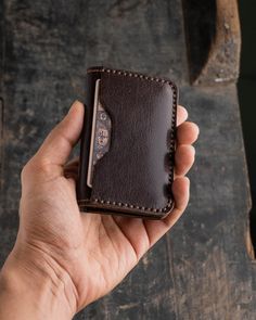 ◉ The wallet is made of 100% Full Grain, Vegetable Tanned Leather. ◉ When closed, the dimensions of the wallet are 3.5″ x 2.5″. (inches) ◉ The wallet is hand-stitched with waxed Japanese thread. ◉ The edges of the wallet are hand-finished/burnished with tokonole and beeswax for both aesthetic appeal and longevity. ◉ The wallet has one card slot that holds 9-11 cards and multiple folded bills. ◉ The wallet is built to last. --- SHIPPING AND DELIVERY --- ⚠️ Same Day Shipping- Fast (Express) Shipping- Free Shipping (India) ◉ Our products are prepared and shipped on the same day as your order. We have an express shipping system. The companies that we have express shipping agreements with are DHL and India Post. ◉ Our products are shipped with their special packaging. Our products are shipped w Men Card Holder, Brown Card Holder With Card Slots For Everyday Carry, Brown Bifold Card Holder With Card Slots, Brown Trifold Card Holder With Coin Pocket, Brown Trifold Card Holder For Daily Use, Brown Bifold Card Holder With Coin Pocket, Japanese Wallet, Biker Wallet, Unique Gifts For Men