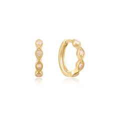 A pair of solid gold opal hoop earrings. Made of 10k solid gold these tiny hoops feature genuine Australian opal. Our solid gold earrings are extremely durable and they are made to last a lifetime. Water-proof, tarnish-proof and hypoallergenic, these dainty huggie hoops are the perfect everyday earrings. Material (Stamped): 10k Solid Gold Gemstone: Australian Opal Closure: Hinged Hoop Size: 8 mm Your jewellery will come to you in our signature pink gift box, ready to gift (or just a lovely treat Elegant Opal Huggie Earrings, Gold Opal Small Hoop Jewelry, Small Gold Opal Hoop Jewelry, Gold Hoop Opal Jewelry, Gold Opal Small Hoop Earrings, Gold Opal Hoop Jewelry, Small Gold Hoop Earrings With Opal, Elegant Opal Hoop Earrings, Elegant Gold Opal Hoop Earrings