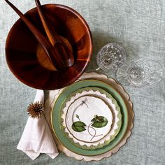 a table with plates and utensils on it