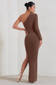 Maternity styles needn't be understated as our stunning Paloma maxi dress proves. Designed in premium stretch jersey with ruching to flatter a growing bump. this brown bodycon dress comes in an asymmetric silhouette that exposes the left leg elegantly. Features- Premium stretch jersey- Asymmetric neckline- Single long sleeve- Bodycon fit- Bump ruching- Invisible zip closure- Asymmetric hemline- Maxi lengthSizing & FitModel is 5'8.5 and wears UK size 8 / US size 4Product InformationDesigned exclu Light Brown Maternity Dress, Brown Maternity Wear Dresses, Brown Maternity Maxi Dress, Brown Bodycon Dress, Maternity V-neck Dress With Ruched Details, Stretch Maternity Dress Bump-friendly, Long Sleeve Bodycon, Paloma, Maternity Fashion