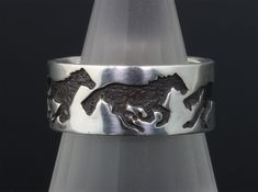 Sterling Silver ring with the four stages of gallop carved into the band. Handcrafted from our original design. Made in the U.S.A.! Free sizing! Free shipping in the U.S.A.! Equine Jewelry, Dog Belt, Equestrian Belts, Horse Ring, Horseshoe Pendant, Equestrian Jewelry, Equestrian Gifts, Horse Jewelry, Lovely Ring