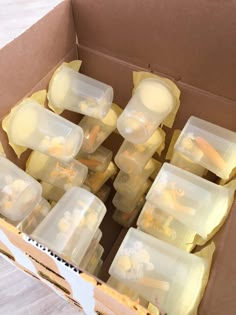 a box filled with lots of plastic containers