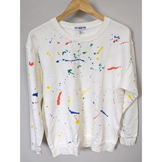 See All Pics For Details Message With Any Questions. White Graffiti Print Top For Fall, Multicolor Paint Splatter Crew Neck Top, White Casual Sweatshirt With Graffiti Print, Casual Paint Splatter Tops Relaxed Fit, Casual Relaxed Fit Tops With Paint Splatter, Casual White Sweatshirt With Graffiti Print, Casual Spring Tops With Paint Splatter, Casual Paint Splatter Top For Spring, Multicolor Paint Splatter Cotton Top