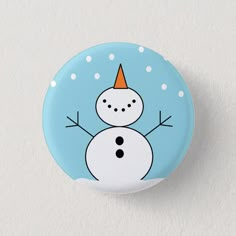 a button with a snowman on it