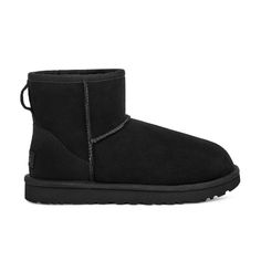 UGG Women's Classic Mini II Boot Black 1016222-BLK UGG's Classic Boot was originally worn by surfers to keep warm after early-morning sessions and has since become iconic for its soft sheepskin and enduring design. Incorporating a durable, ultra-lightweight sole to increase cushioning and traction, these versatile boots pair well with practically anything – try loose boyfriend jeans and a velvet top. These provide comfort for people who suffer from bunions, plantar fasciitis, metatarsalgia, heel Classic Mini Ii Boot, Classic Ugg Boots, Black Uggs, Ugg Classic, Snow Boots Women, Classic Boots, Bearpaw Boots, Classic Mini, Slipper Boots