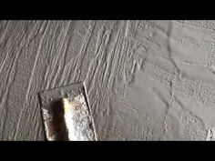 the floor is covered in white paint and has been stripped off from it's surface