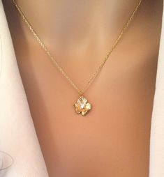 "Before you buy, be sure to get 20% off your order by joining the Balm Designs Sisterhood! Just copy and paste this url in a new tab and you will get your instant coupon code: http://bit.ly/BalmDesigns This simple flower girl proposal necklace is handmade using a beautiful gold or silver flower pendant with a lovely cubic zirconium center and hangs on a high quality gold or silver chain. Choose your length from 14\" to 18\" long. Pendant measures approximately 1/2\". Weighs approximately .1oz. ( Flower Shaped Wedding Necklace For Valentine's Day, Valentine's Day Flower Necklace For Wedding, Flower Shaped Necklace For Valentine's Day Wedding, Wedding Flower Necklace With Flower Charm, Flower Shaped Necklace For Wedding And Mother's Day, Feminine Gold Flower Necklace For Wedding, Gold Feminine Flower Necklace For Wedding, Delicate Flower Necklace For Party, Gold Flower Charm Necklace For Wedding