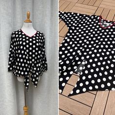 "For sale is a Jordana beautiful black and white polka dot rayon and acetate blouse with batwing half sleeves and a red trim on the v-neck neckline, ties at the bottom front in the 1990's in the USA. Great condition. Size M (10-12). See measurements below for proper fit.  Measurements (flat): Shoulder to shoulder: 13\" Armpit to armpit: 25\" Overall length: 29\" Sleeve length: 17\"" Trendy Black Blouse With 3/4 Sleeves, Trendy Polka Dot V-neck Top, Black Summer Top With Kimono Sleeves, Black Kimono Sleeves Top For Spring, V-neck Polka Dot Blouse For Summer, Chic V-neck Polka Dot Blouse, Black Batwing Sleeve Blouse For Summer, V-neck Polka Dot Summer Blouse, Izod Lacoste