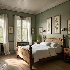 a bedroom with green walls and white curtains, wooden bed frame, hardwood flooring