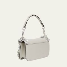 Valentino Garavani "Loco" leather shoulder bag with glass jeweled trim  Detachable top handle  Detachable chain crossbody strap Can be worn as a top handle or crossbody bag  Flap top with VLOGO magnetic closure  Approx. 3.9"H x 7.9"W x 2"D Made in Italy Luxury Shoulder Bag With Silver-tone Hardware Handheld, Top Handle Bags With Palladium Hardware, Luxury Handheld Shoulder Bag With Silver-tone Hardware, Elegant Top Handle Flap Bag With Branded Hardware, Elegant Flap Bag With Palladium Hardware, Luxury Handheld Bag With Chain Strap, High-end Flap Clutch Bag With Detachable Strap, Elegant Evening Flap Bag With Branded Hardware, Luxury Shoulder Bag With Silver-tone Hardware And Top Handle