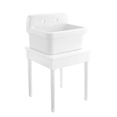 a white sink sitting on top of a wooden stand