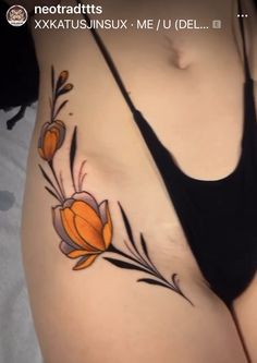 an image of a woman's stomach with flowers on it