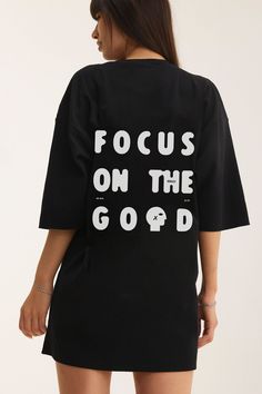 Embrace positivity with our black cotton oversized T-shirt, featuring the inspiring "Focus on the Good" quote boldly printed on the back. Designed for both comfort and style, this tee offers a relaxed, oversized fit with lowered shoulders, creating a laid-back yet modern silhouette. The soft, high-quality cotton fabric ensures all-day comfort, making it perfect for casual wear or layering. The motivational quote serves as a daily reminder to keep your outlook bright, adding a thoughtful touch to Oversized Black T Shirt, The Good Quote, Focus Design, Good Quote, Focus On The Good, July Birthstone Jewelry, Gifts For New Mums, Pearl Jewellery Earrings, Oversized T Shirt