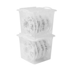 three plastic containers filled with white spools