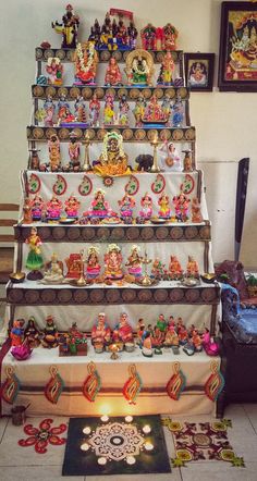 an assortment of hindu figurines on display