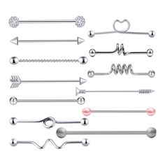 six different types of piercings with hearts, arrows and heart shaped balls on them