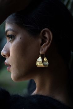 Material: 18kt gold plated | Nickel free | Lead free | Non Allergic | High Quality Italian Recycled Brass  These designer danglers are extremely light to wear and make for a perfect statement look. Sway them to your mood and find yourself wearing them to all occasions.  It is a very striking pair in the shape of a bucket scoop and has a very pretty texture on them.  Also, these are an absolutely a light weighted wear. The pair together just weighs 9 gms. Care for all your jewelry pieces like you Gold Plated Danglers Drop Earrings For Gift, Gold Nickel-free Danglers As Gift, Tarnish Resistant Brass Earrings For Gift, Yellow Gold Teardrop Earrings Gift, Nickel-free Danglers As A Gift, Brass Teardrop Earrings As Gift, Nickel-free Gold Danglers For Gift, Teardrop Danglers For Gift, Gold Plated Drop Earrings As A Gift