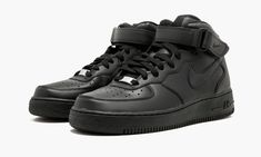 The Nike Air Force 1 Mid “Triple Black” is an all-black colorway of the enduring Air Force 1 model in mid-top form. Beloved in New York City, the DMV, and just about everywhere else you could think of, the Air Force 1 and all of its variances in height are a staple footwear option for stylish people. This particular model features an all-black leather upper, which includes the perforated toe, mid-panel, collar, and heel. Tonal Swoosh detailing appears on the mid-panel as well as on the mini Swoo Triple Black Shoes, Black Air Force 1, Nike Air Force 1 Mid, Air Force 1 Mid, Nike Models, Stylish Mens Outfits, Stadium Goods, Triple Black, Sneakers Men Fashion