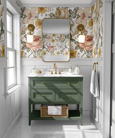 a bathroom with blue vanity and floral wallpaper on the walls, along with two mirrors