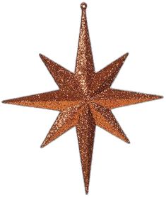 an ornament shaped like a star on a white background