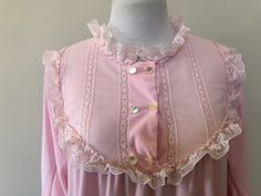 "Small Pink Nightgown  Montgomery Ward  Long Sleeve  Lace Trim  Vintage Nightwear  21\" pit to pit From Our Cincinnati Store Buy several items!  Shipping is combined and overage refunded when you buy multiple items! \"Nay, I am the very pink of courtesy.\" ~Mercutio, Romeo and Juliet, William Shakespeare The word \"pink\" became part of the English language in 1573 as the name of a plant, not a color.  Less than 25 years later, it was used to describe a level of courtesy as seen in William Shake Feminine Lace Trim Nightgown For Overnight, Long Sleeve Nightgown With Lace Trim For Sleepover, Long Sleeve Lace Trim Sleepwear For Sleepovers, Long Sleeve Sleepwear With Lace Trim For Pajama Party, Pink Lace Trim Nightgown For Sleepover, Pink Nightgown With Lace Trim For Sleepovers, Long Sleeve Lace Trim Sleepwear For Bedtime, Long Sleeve Lace Trim Sleepwear, Pink Lace Trim Chemise For Daywear