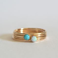 Set of four dainty stacking rings. 3mm natural turquoise and lab grown white opal. Two hand hammered bands. Polished for a beautiful shine finish. Please note: This turquoise is a natural stone and color/detail will vary from stone to stone. *MATERIAL OPTIONS- -14k Gold Filled -14k Solid (Yellow) Gold -14k Solid Rose Gold -14k Solid White Gold Made to order in your size. Sizes in drop down box are U.S. ring size.  I really want you to be happy with your purchase. If you have any questions or con Rings Turquoise, I Really Want You, Rings Boho, White Opal Ring, Winston Salem Nc, Hammered Band, S Ring, Gold Piece, Solid Gold Rings