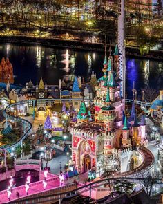 an aerial view of the amusement park at night