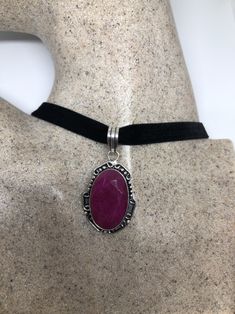 Brilliant dark Red ruby Lovely handmade silver work Low content silver NOT 925 Sterling Silver About 2 inch long All jewelry is shipped in a nice gift box. Check out our over a THOUSAND great reviews Silver Oval Ruby Jewelry, Oval Ruby Silver Jewelry, Silver Ruby Jewelry For Gift, Silver Ruby Gemstone Jewelry, Classic Ruby Jewelry In Burgundy, Classic Burgundy Ruby Jewelry, Nickel-free Ruby Jewelry Gift, Nickel-free Ruby Jewelry For Gifts, Handmade Vintage Ruby Jewelry