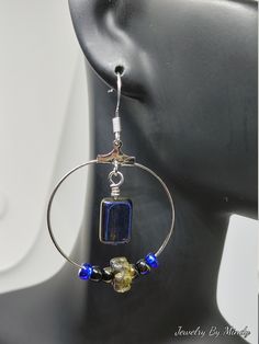 These earrings are made using glass czech beads and beading hoops Blue Beaded Circle Jewelry, Adjustable Hoop Jewelry With Dangling Beads, Adjustable Hoop Earrings With Dangling Beads, Bohemian Beaded Earrings With Dangling Glass Beads, Bohemian Glass Beaded Drop Earrings, Blue Beaded Metal Hoop Earrings, Adjustable Small Hoop Jewelry With Dangling Beads, Bohemian Beaded Earrings With Glass Ear Wire, Bohemian Glass Beaded Earrings With Ear Wire